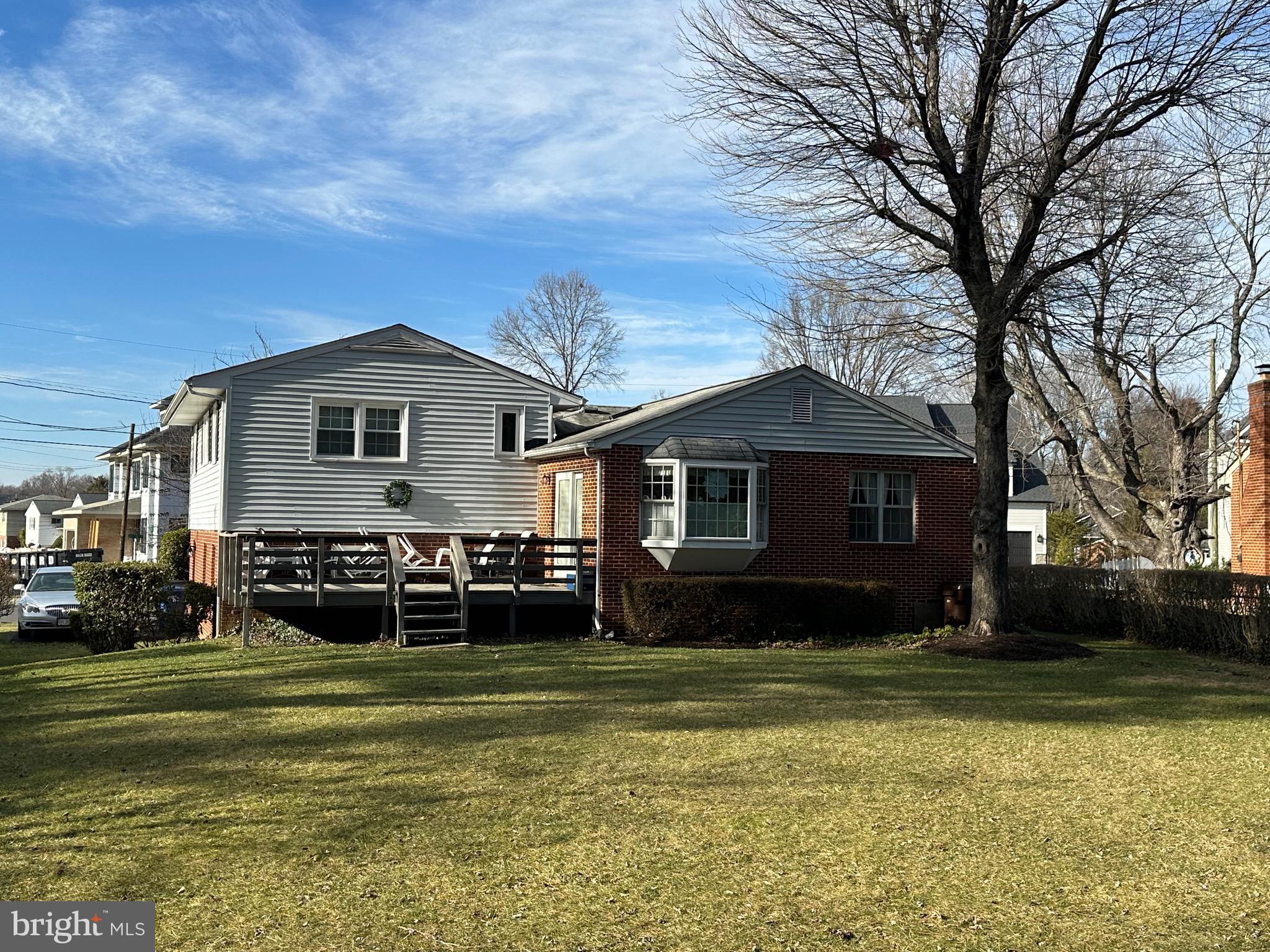 7105 Sea Cliff Road McLean, VA 22101 - Photo 4 of 6 a front view of a house with a yard