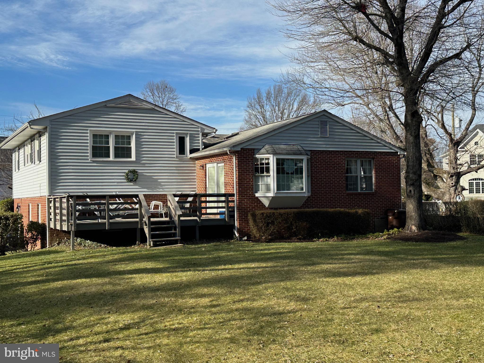 7105 Sea Cliff Road McLean, VA 22101 - Photo 5 of 6 a front view of a house with a yard
