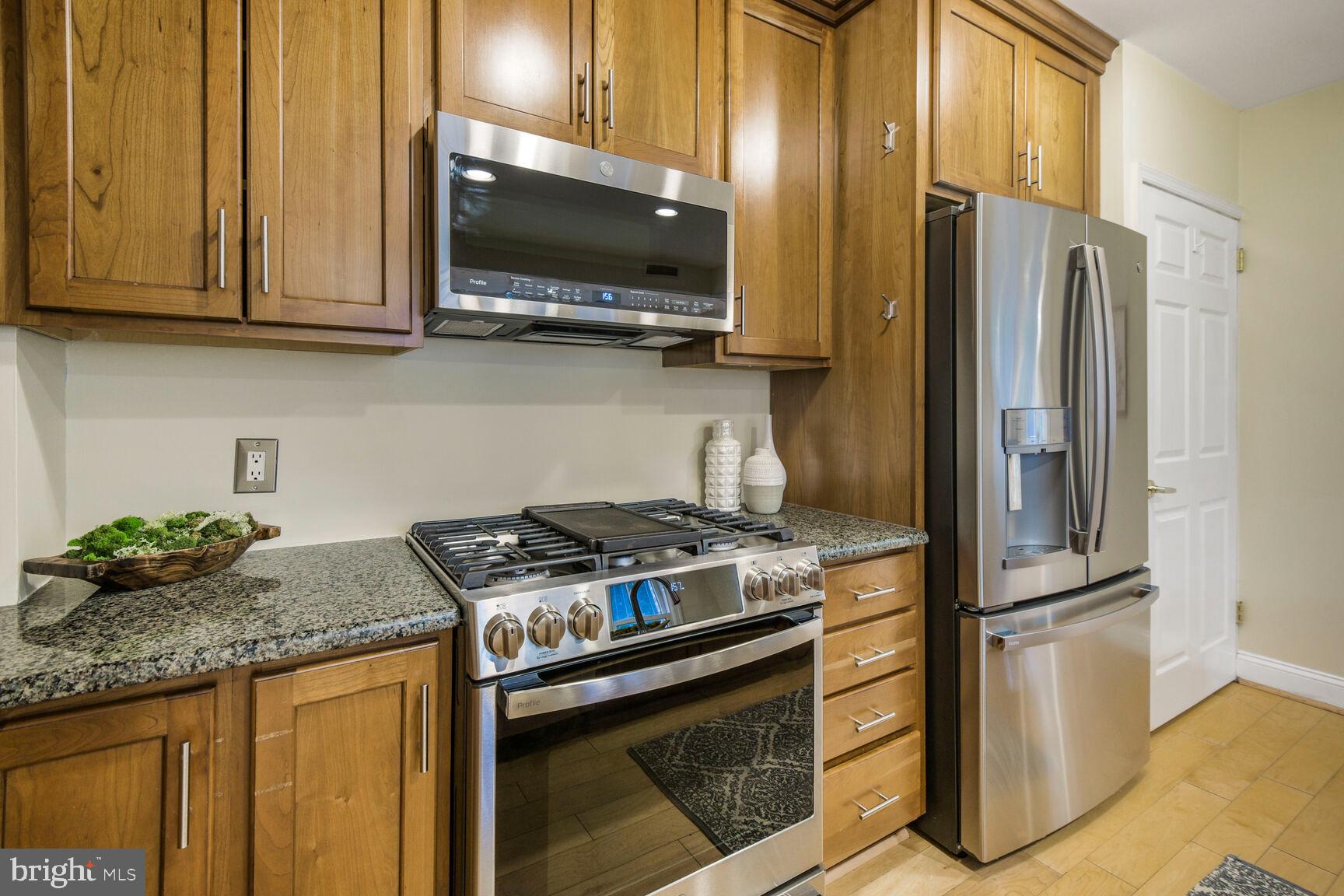 1661 Crescent Place Northwest, Unit 102 Washington, DC 20009 - Photo 12 of 34 Gourmet Kitchen with Stainless Appliances
