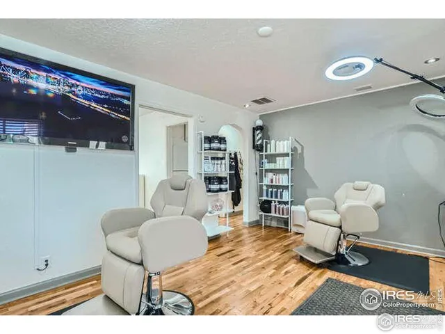 a kitchen with a sink a stove and cabinets