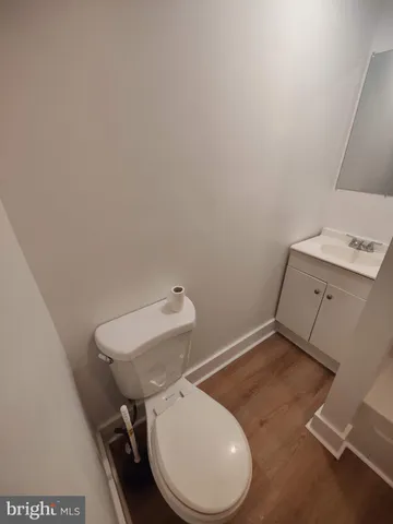 a bathroom with a toilet and a sink