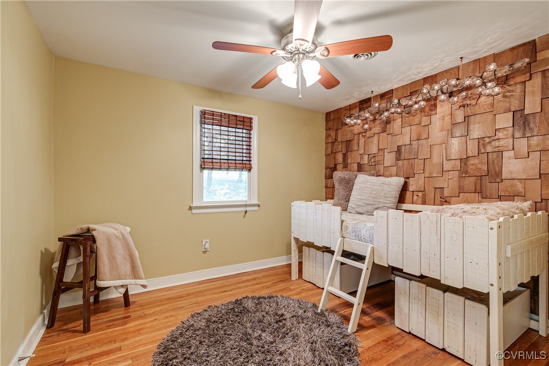 6737 Rural Point Road Mechanicsville, VA 23116 - Photo 19 of 32 Bedroom featuring light hardwood / wood-style floo