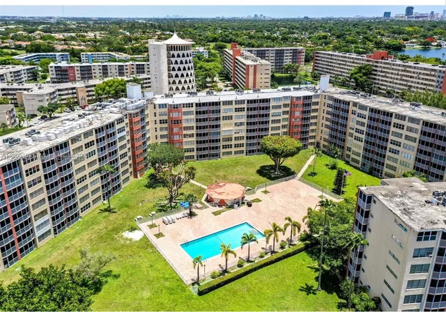 a picture of city view with lake view and mountain view in back