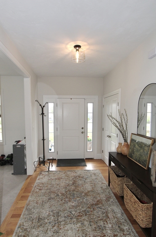 99 Osgood Road Charlton, MA 01507 - Photo 2 of 18 a view of livingroom with furniture and wooden floor
