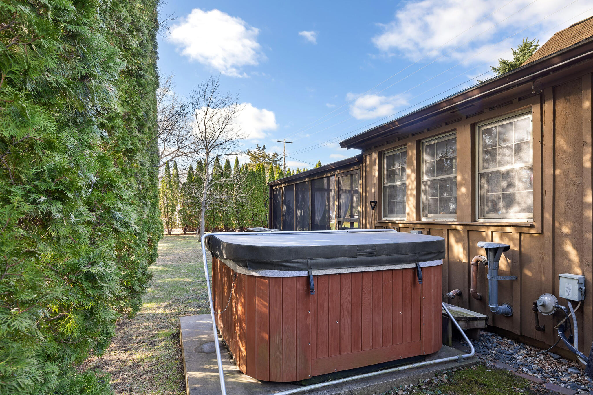 46652 River Street Dresbach, MN 55947 - Photo 27 of 32 27 HOT TUB BEDHIND HOUSE