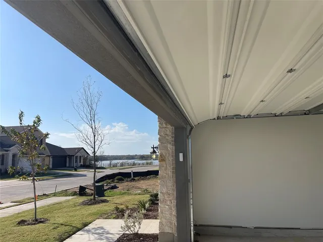 a view of swimming pool with yard