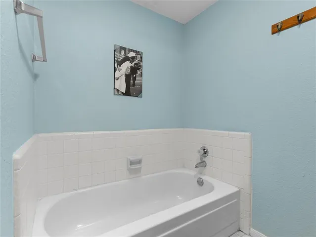 a bathroom with a bathtub