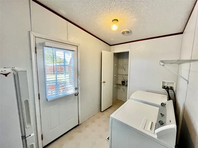 a bathroom with a sink and shower