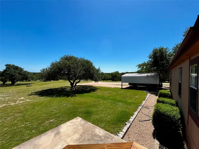 a view of a garden with a slide