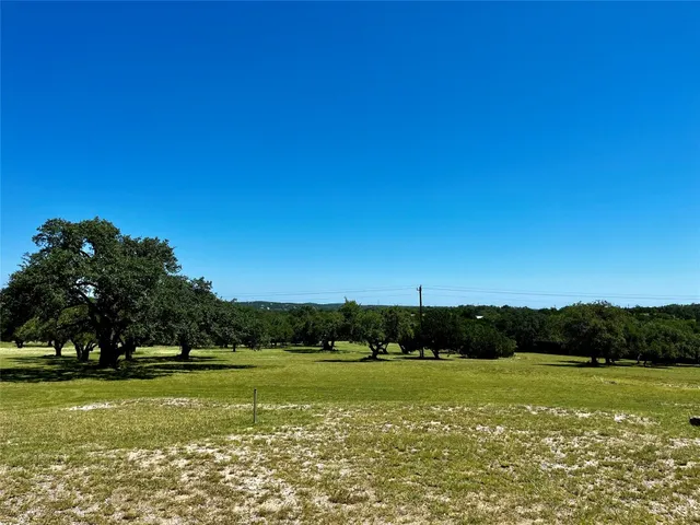 a view of a lake from a yard