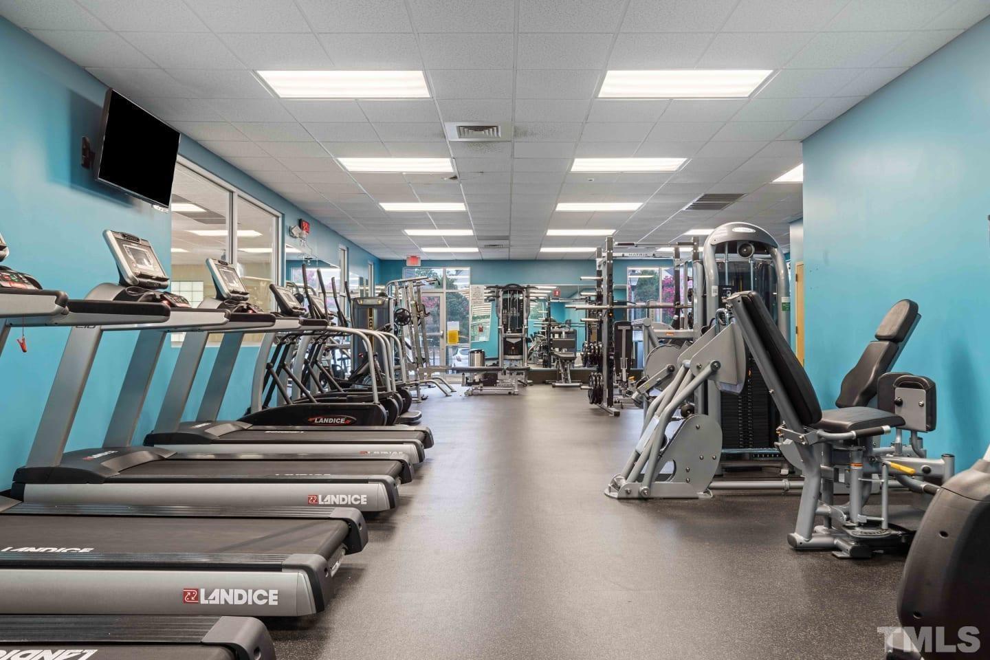 2101 Blackwolf Run Lane, Unit 5609 Raleigh, NC 27604 - Photo 15 of 19 a view of a room with gym equipment
