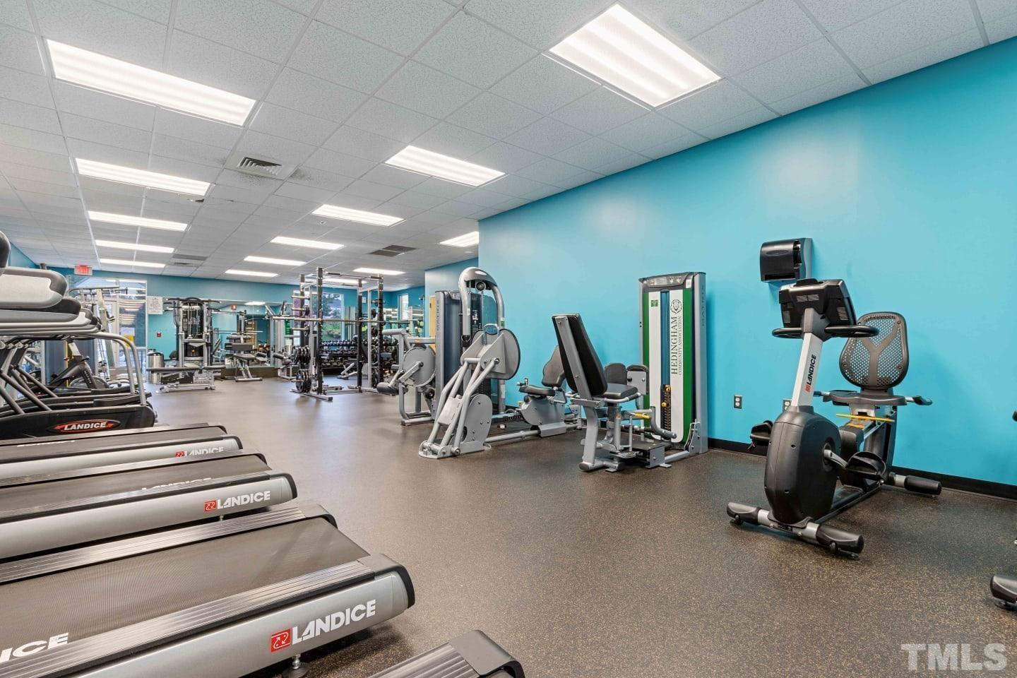 2101 Blackwolf Run Lane, Unit 5609 Raleigh, NC 27604 - Photo 17 of 19 a view of a room with gym equipment