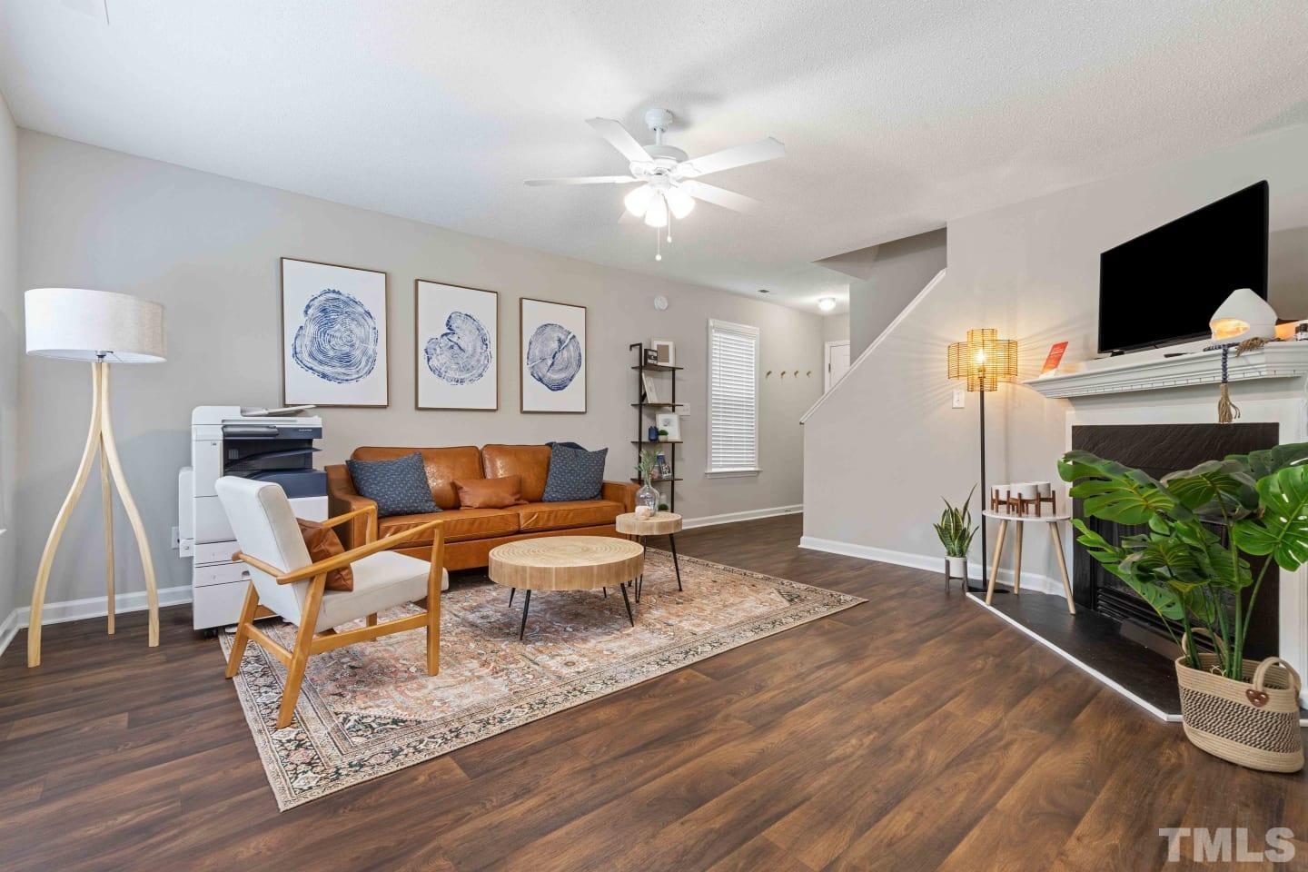 2101 Blackwolf Run Lane, Unit 5609 Raleigh, NC 27604 - Photo 10 of 19 a living room with furniture and wooden floor