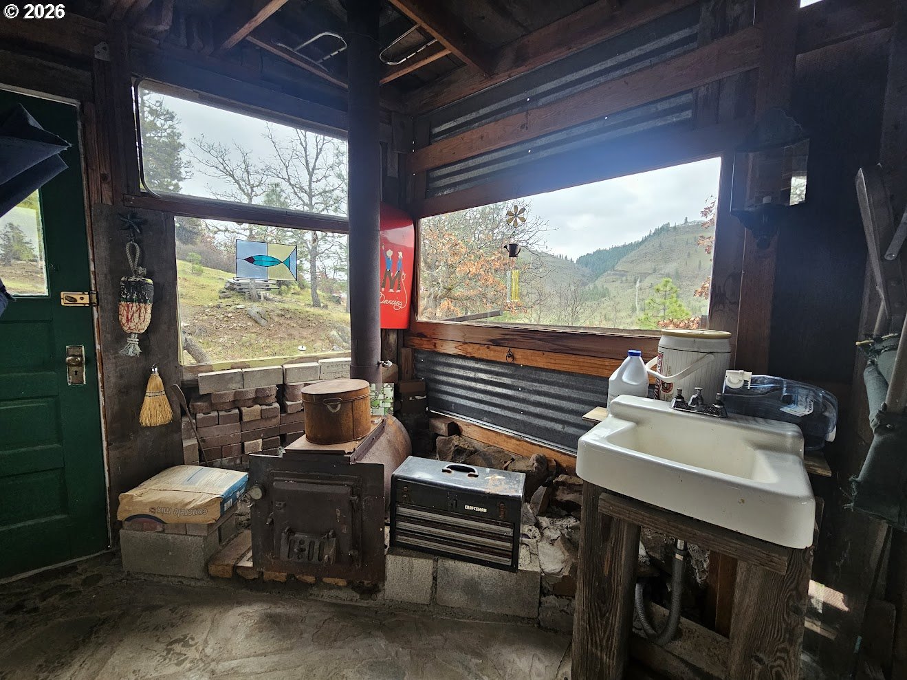 Wahkiacus Heights Road Klickitat, WA 98670 - Photo 39 of 42 a room with furniture and a window