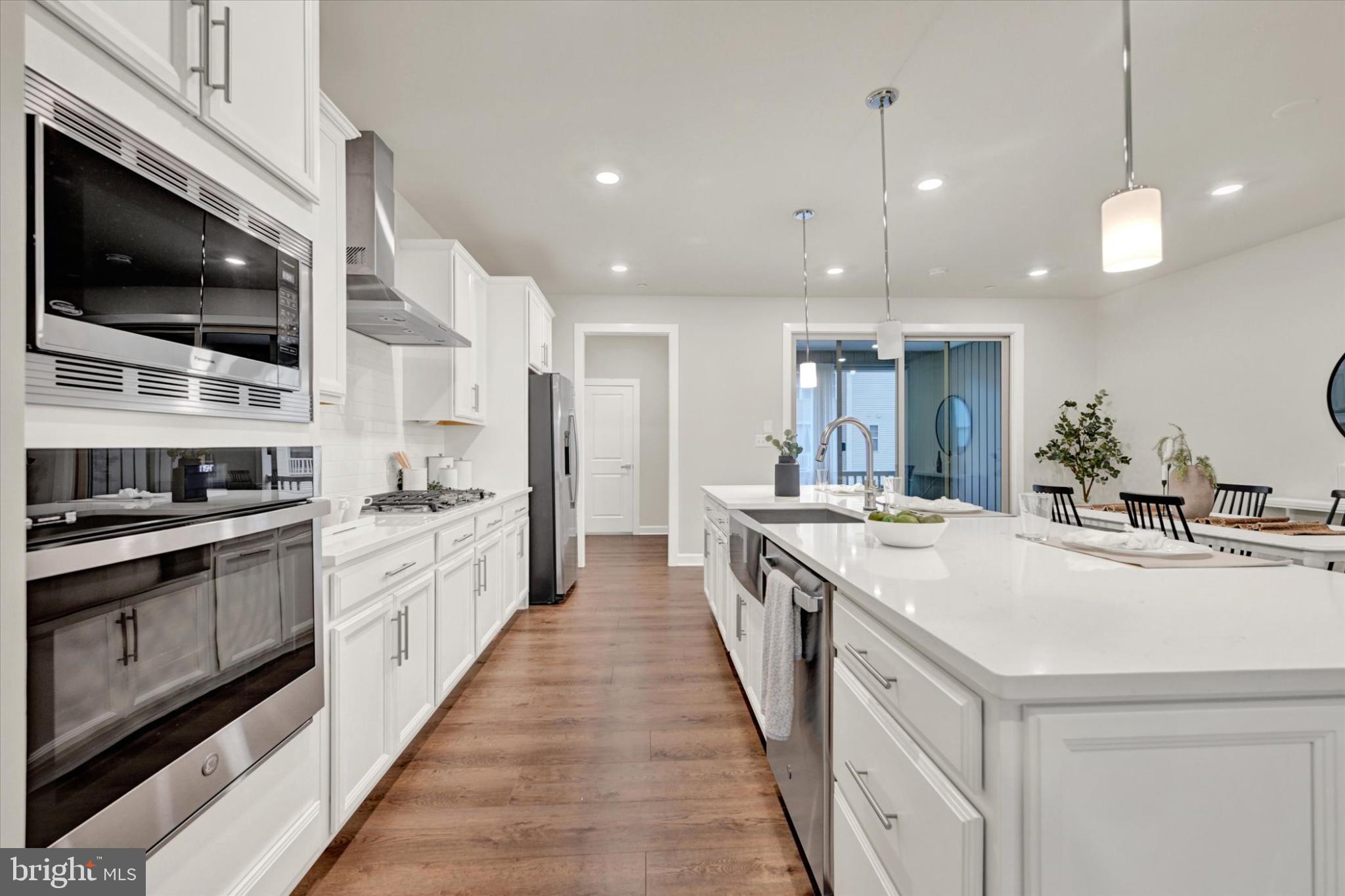 1729 Mill Branch Drive Laurel, MD 20708 - Photo 12 of 28 Sleek modern kitchen with elegant finishes.