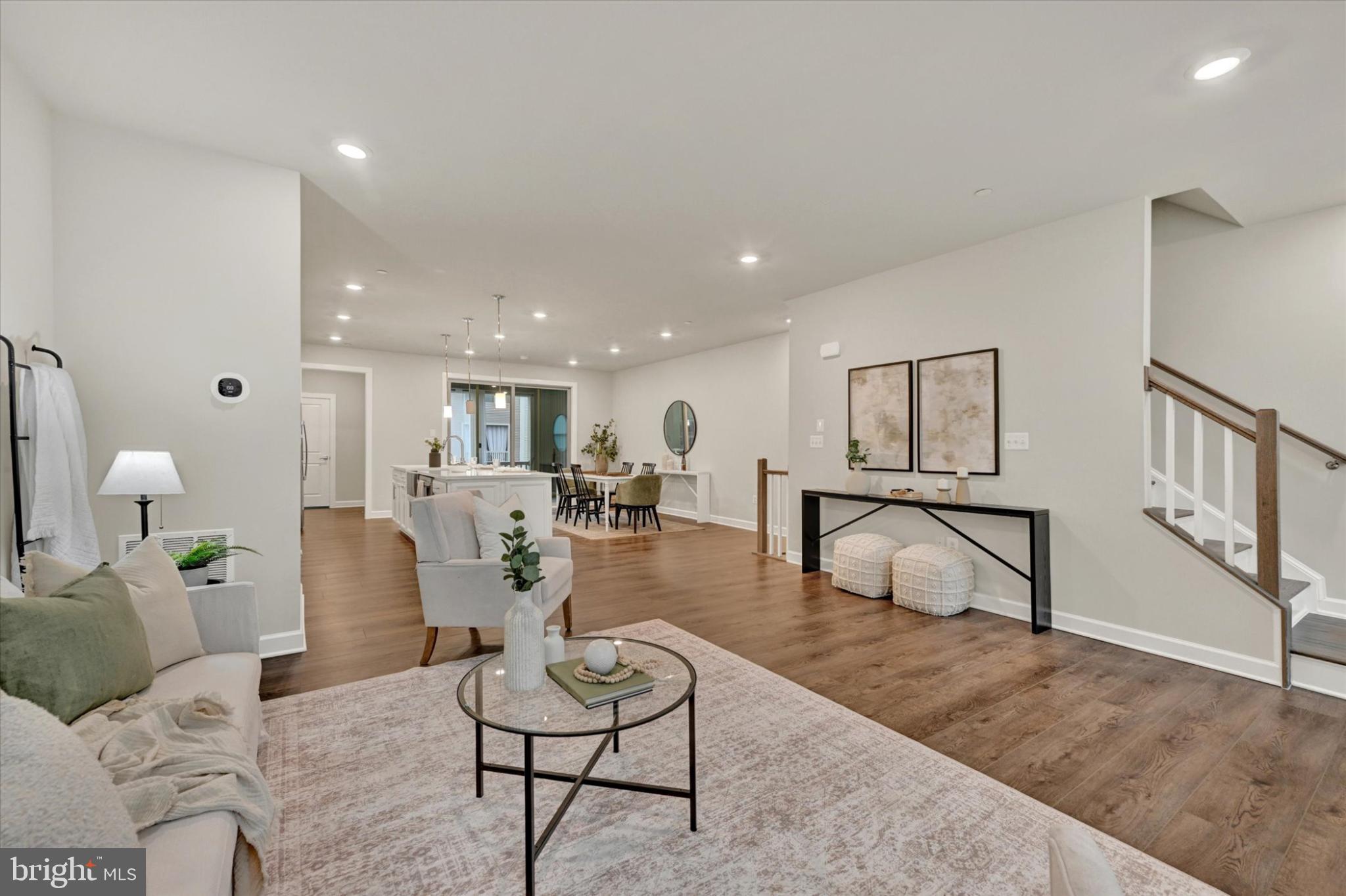 1729 Mill Branch Drive Laurel, MD 20708 - Photo 17 of 28 Spacious modern living area with warm tones.