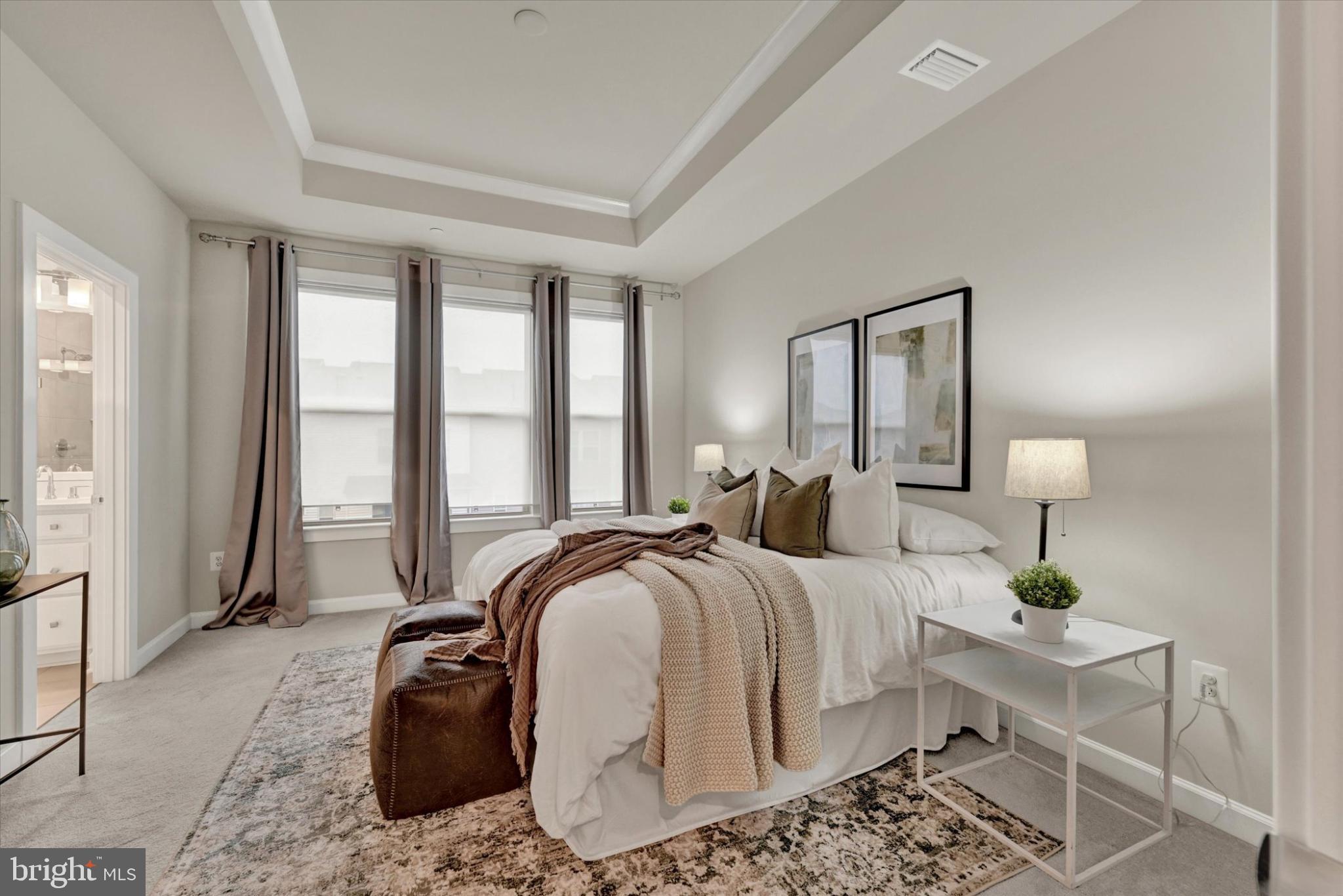 1729 Mill Branch Drive Laurel, MD 20708 - Photo 18 of 28 Serene bedroom with natural light and elegance.