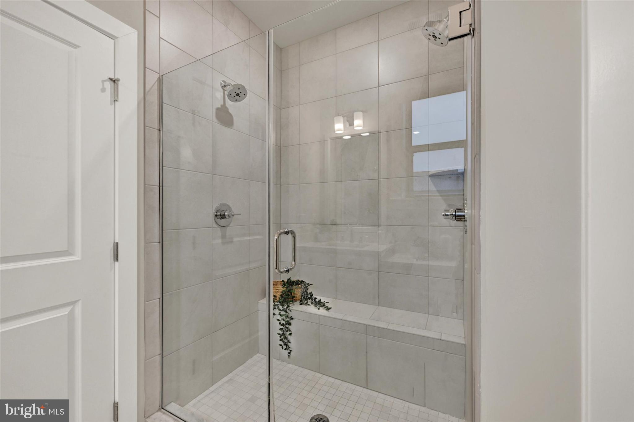 1729 Mill Branch Drive Laurel, MD 20708 - Photo 22 of 28 Sleek modern shower with elegant finishes.
