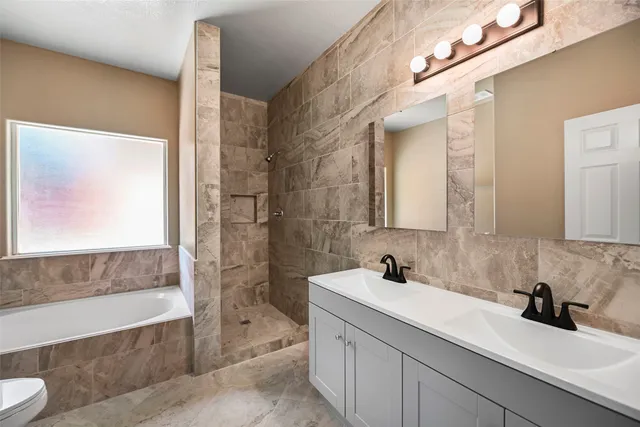 a bathroom with a sink and a bathtub