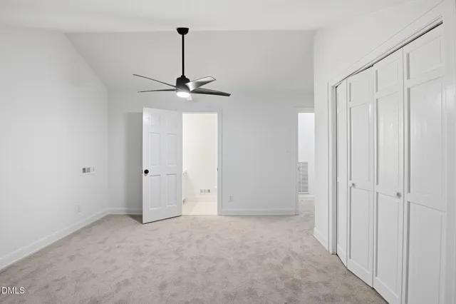 a view of a chandelier fan in a room