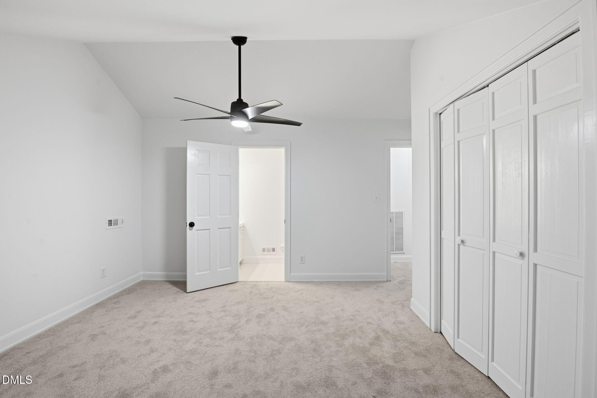 2205 Landings Way Raleigh, NC 27615 - Photo 16 of 35 a view of a chandelier fan in a room