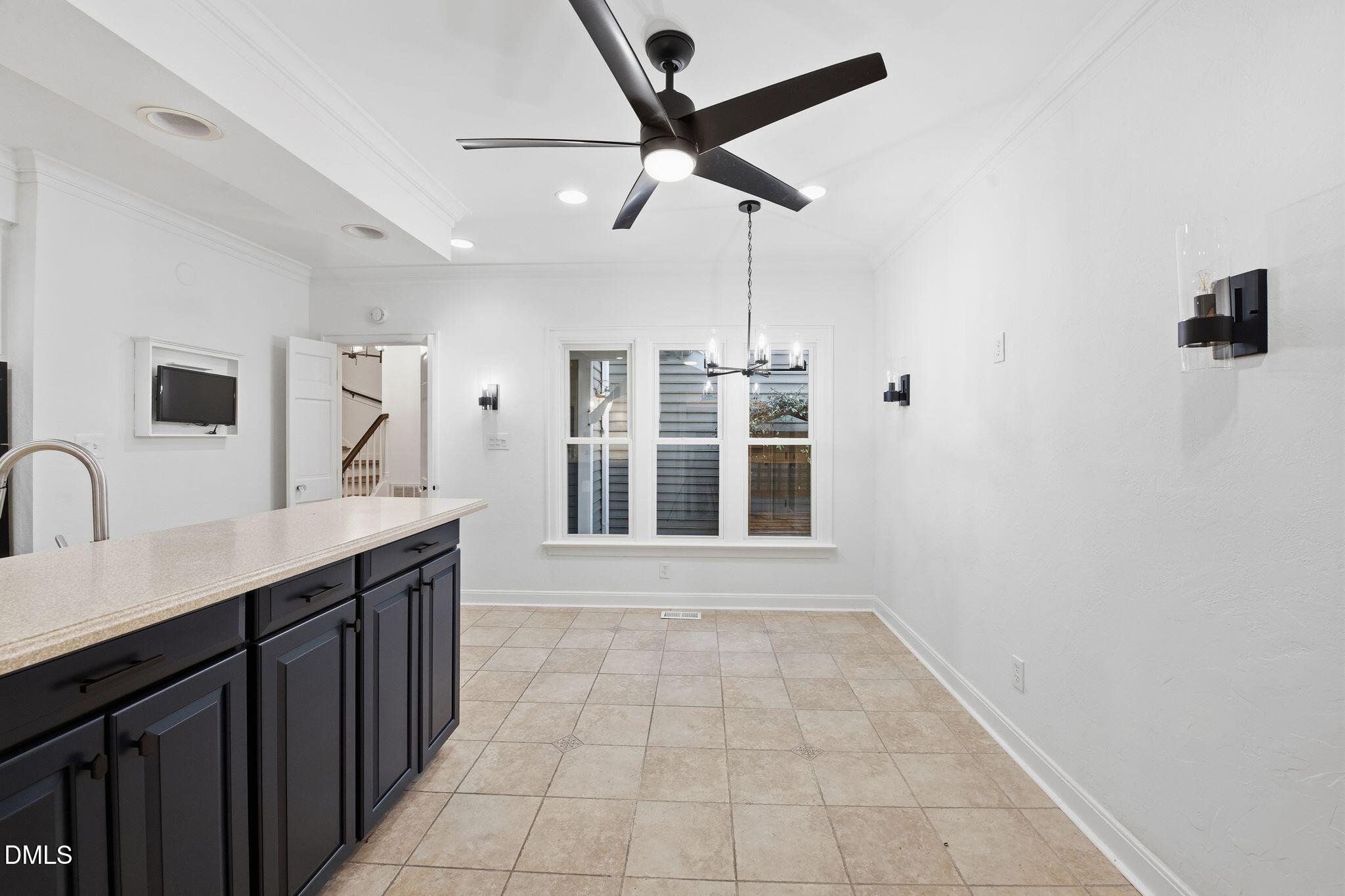 2205 Landings Way Raleigh, NC 27615 - Photo 9 of 35 a view of a bathroom with a sink and a mirror