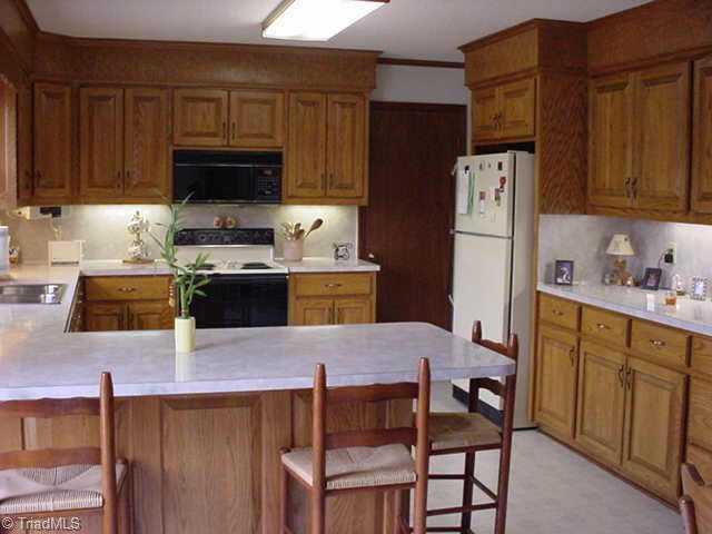 4985 Whitman Road Pfafftown, NC 27040 - Photo 4 of 8 Other. Spacious kitchen with breakfast bar, pantry and lots of counter space
