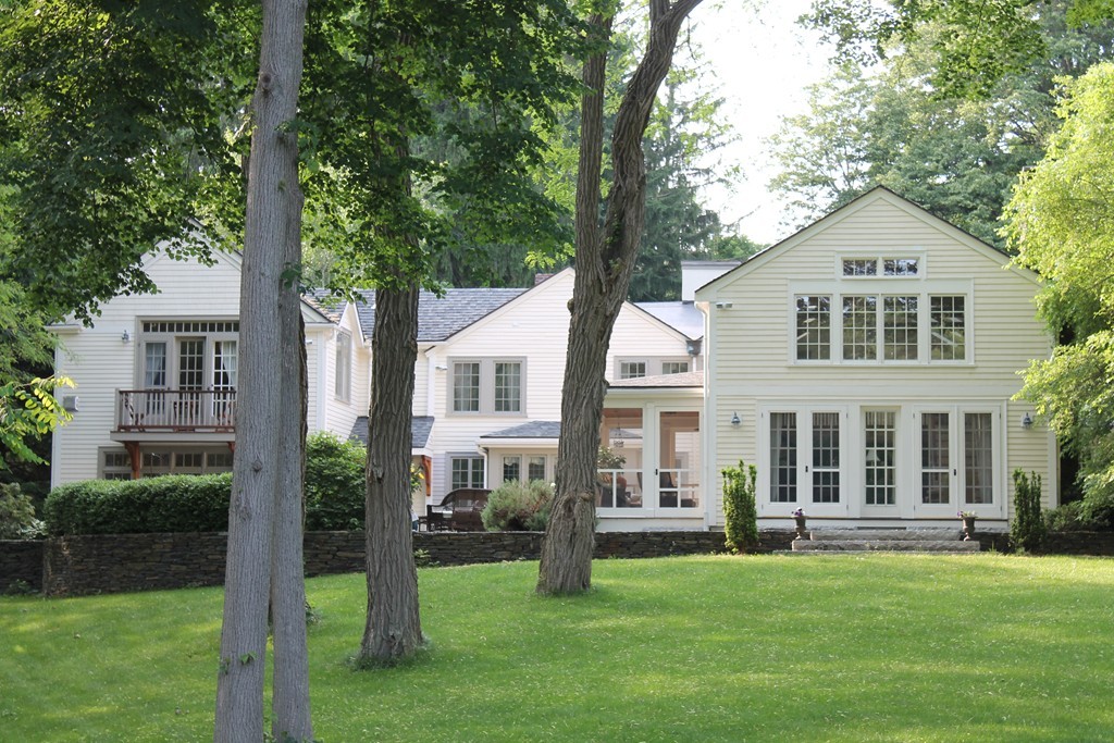 489 Bay Road Hamilton, MA 01982 - Photo 1 of 30 a front view of a house with a yard
