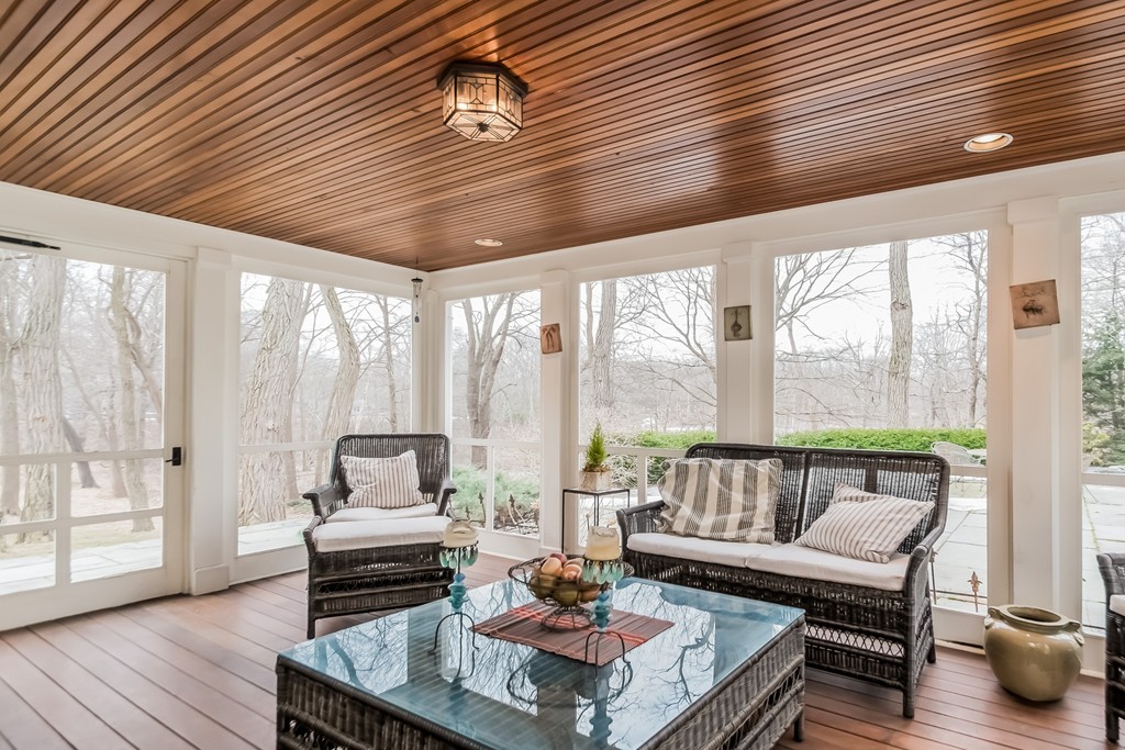 489 Bay Road Hamilton, MA 01982 - Photo 15 of 30 a living room with furniture and a floor to ceiling window