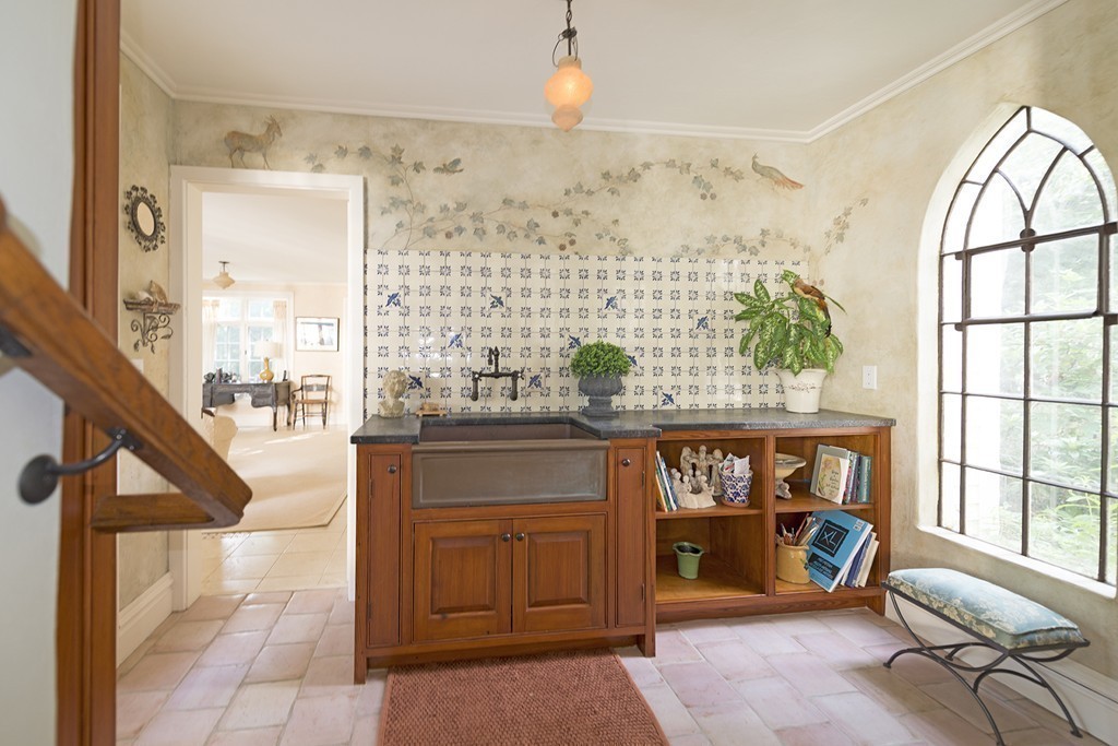 489 Bay Road Hamilton, MA 01982 - Photo 16 of 30 a living room with a couch and a large window