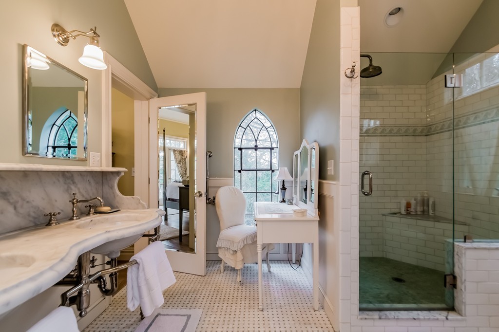 489 Bay Road Hamilton, MA 01982 - Photo 19 of 30 a bedroom with a bed and a painting on the wall