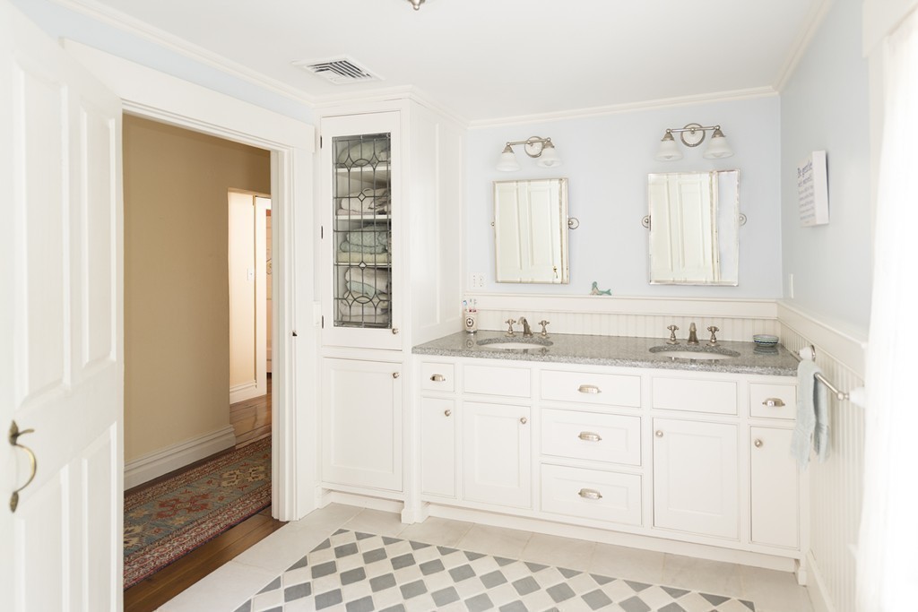 489 Bay Road Hamilton, MA 01982 - Photo 22 of 30 a bathroom with a sink and a mirror