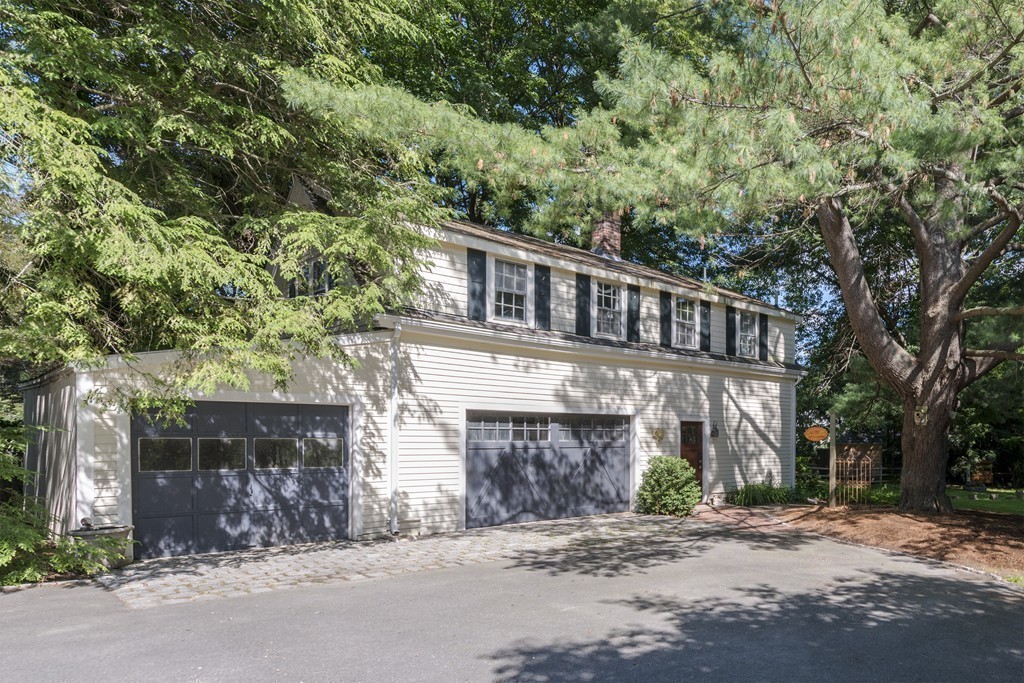489 Bay Road Hamilton, MA 01982 - Photo 26 of 30 a front view of a house with a yard
