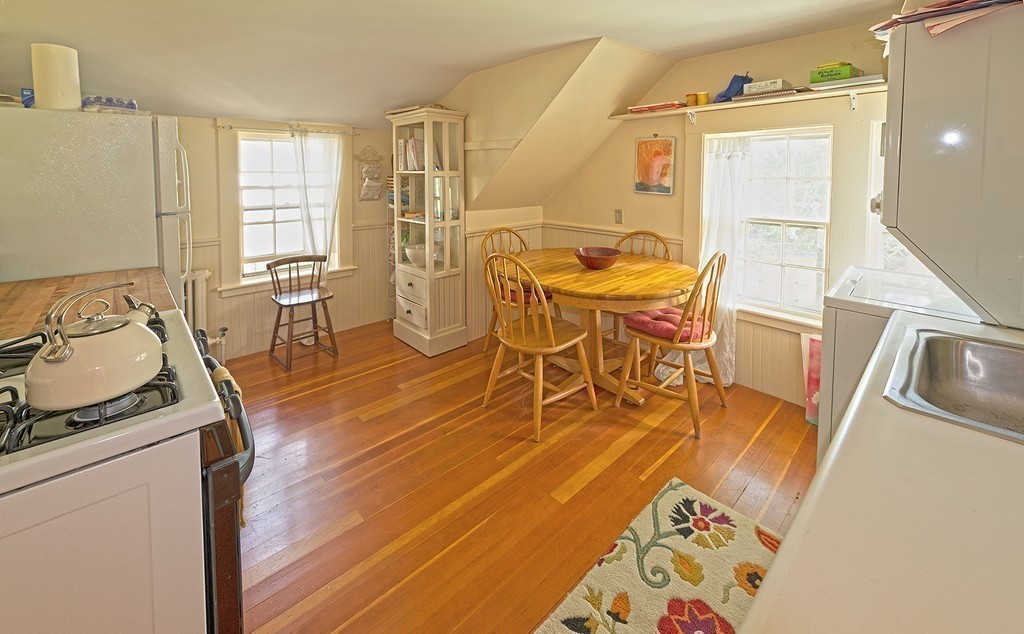 489 Bay Road Hamilton, MA 01982 - Photo 28 of 30 a view of a dining room with furniture and wooden floor