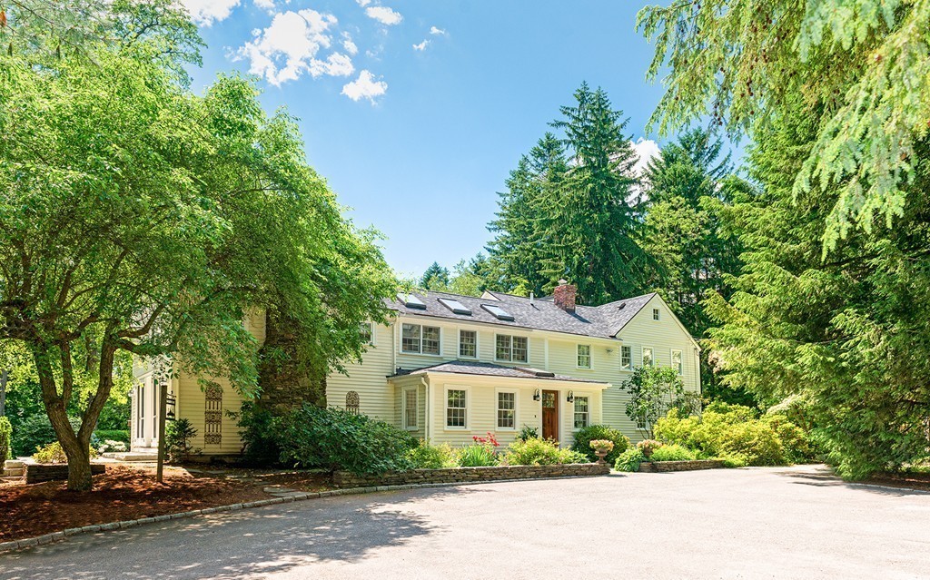 489 Bay Road Hamilton, MA 01982 - Photo 3 of 30 a front view of a house with a yard and a garden