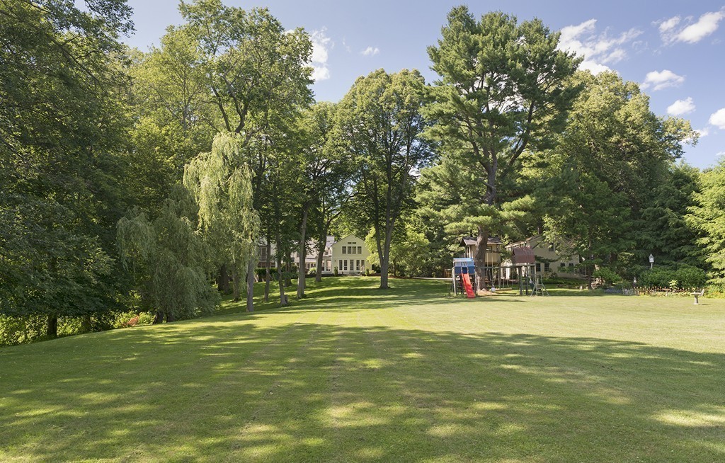 489 Bay Road Hamilton, MA 01982 - Photo 8 of 30 a view of a swimming pool with an outdoor space and seating area