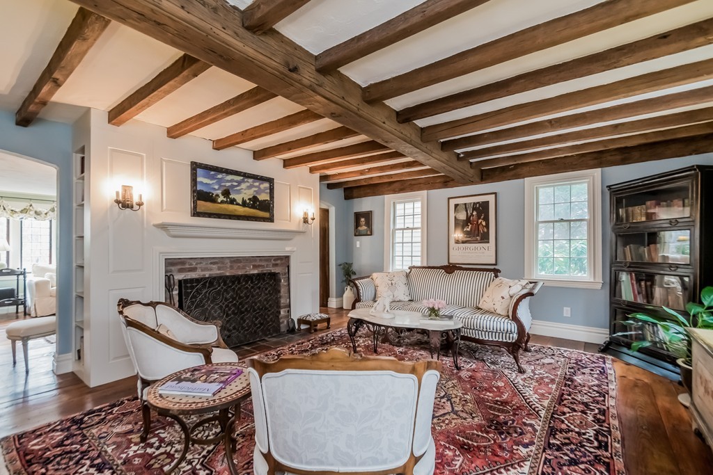 489 Bay Road Hamilton, MA 01982 - Photo 9 of 30 a living room with furniture and a fireplace