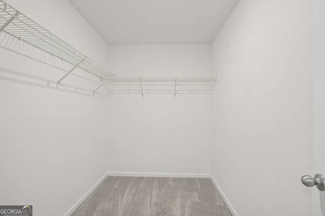 a view of a room with racks on the wall