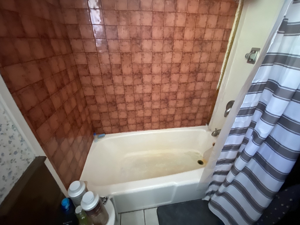109 Brookfield Road Brimfield, MA 01010 - Photo 14 of 19 a bathroom with a bathtub and shower