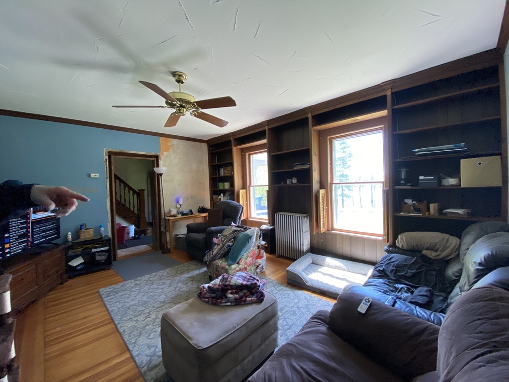 109 Brookfield Road Brimfield, MA 01010 - Photo 16 of 19 a living room with furniture and a large window