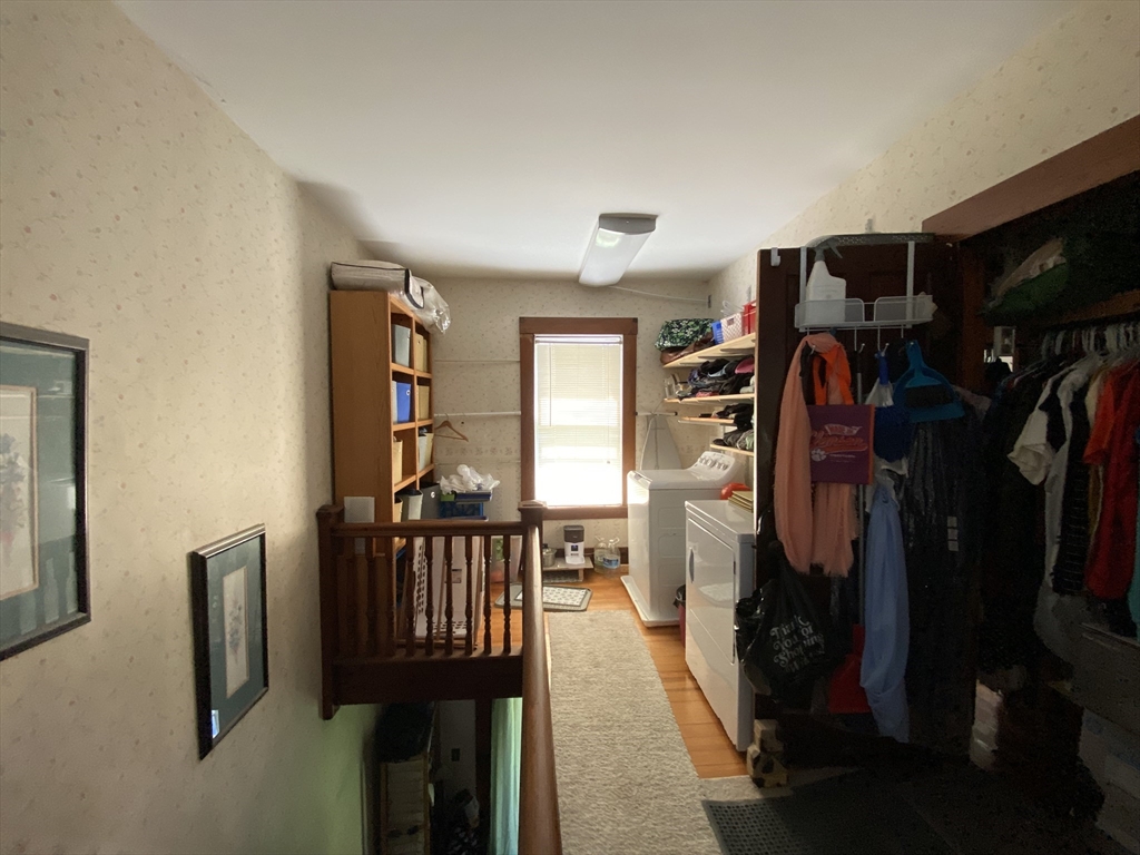 109 Brookfield Road Brimfield, MA 01010 - Photo 9 of 19 a walk in closet with wooden floor