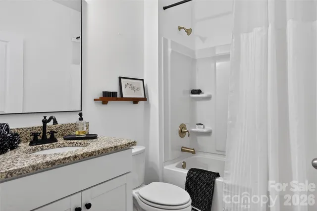 a view of a house with pool and sitting area