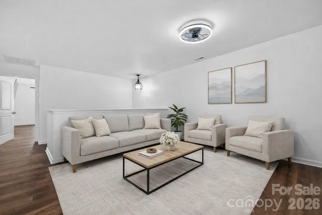 a view of a swimming pool with a lounge chairs