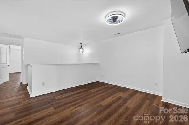 a view of houses with a swimming pool