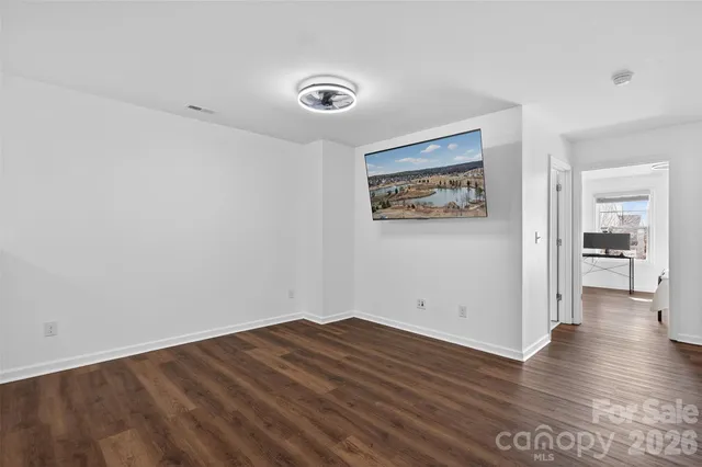 swimming pool view with a seating space