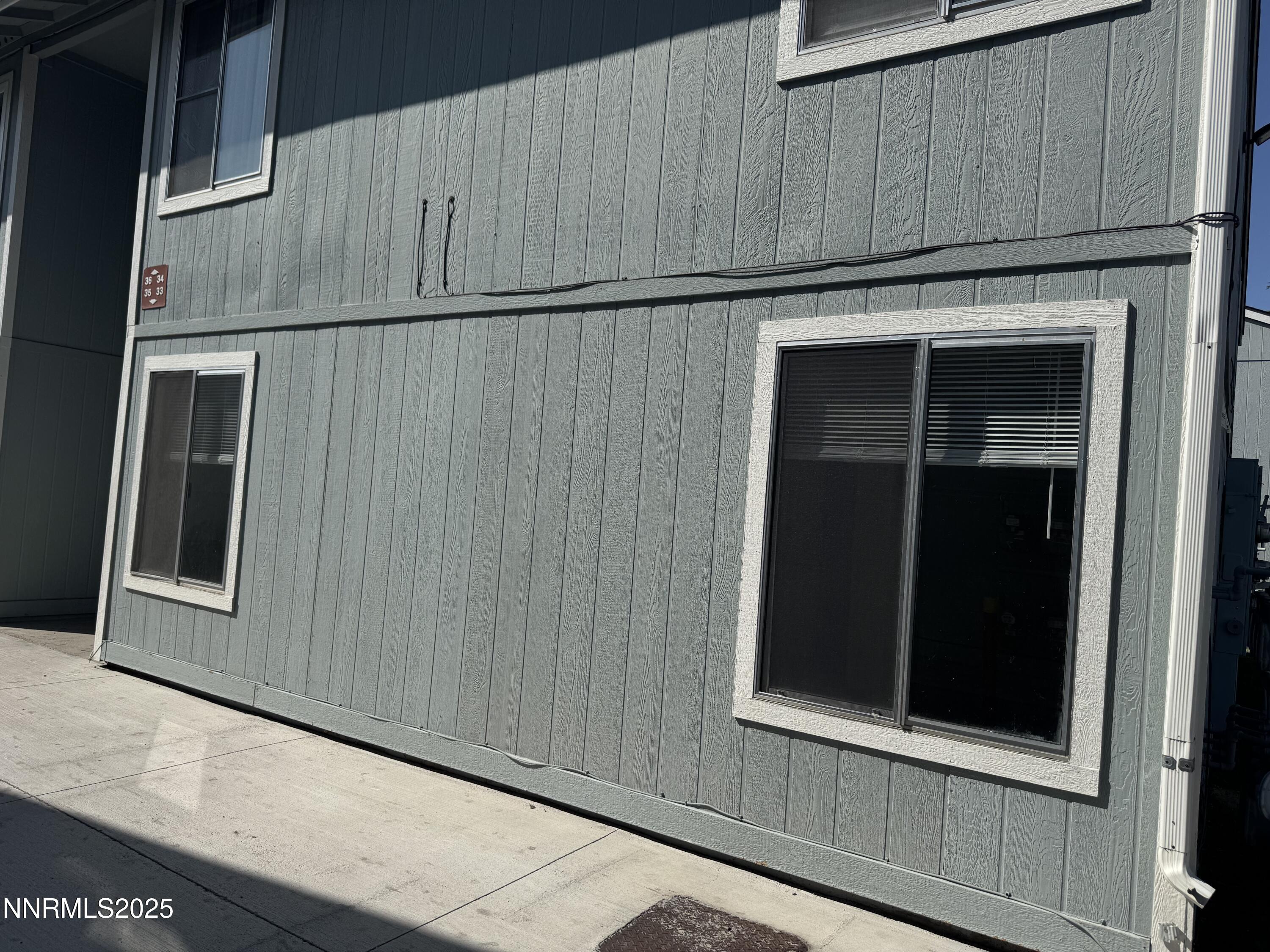4600 Neil Road, Unit 33 Reno, NV 89502 - Photo 2 of 13 a view of a door and wooden wall