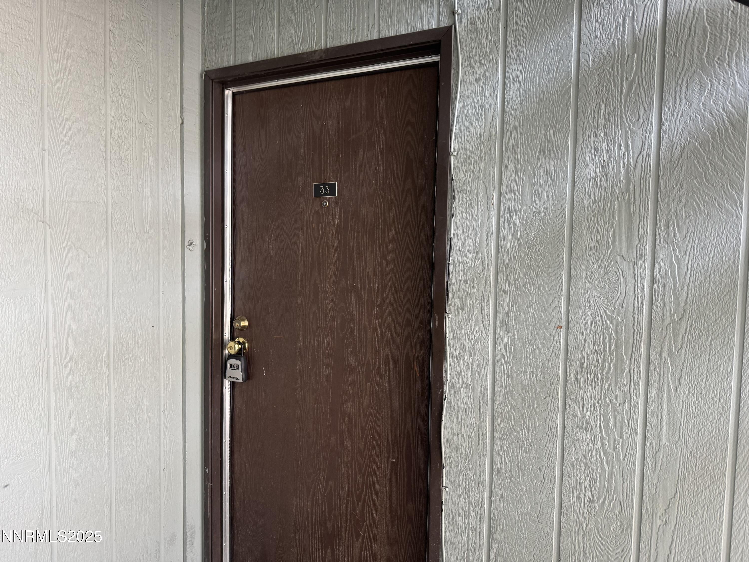 4600 Neil Road, Unit 33 Reno, NV 89502 - Photo 3 of 13 a bathroom with a glass shower door