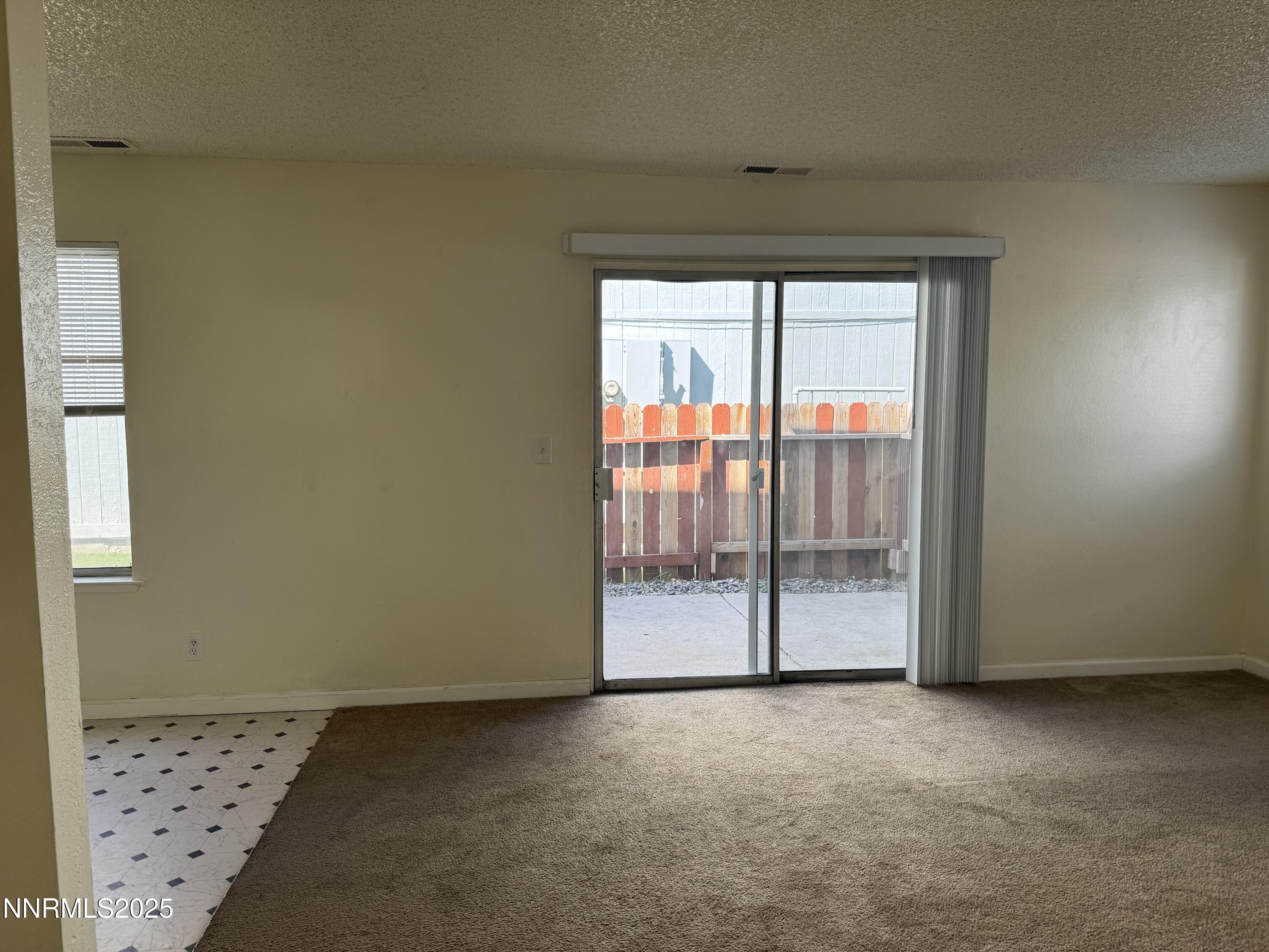 4600 Neil Road, Unit 33 Reno, NV 89502 - Photo 7 of 13 a view of a room with sliding glass door