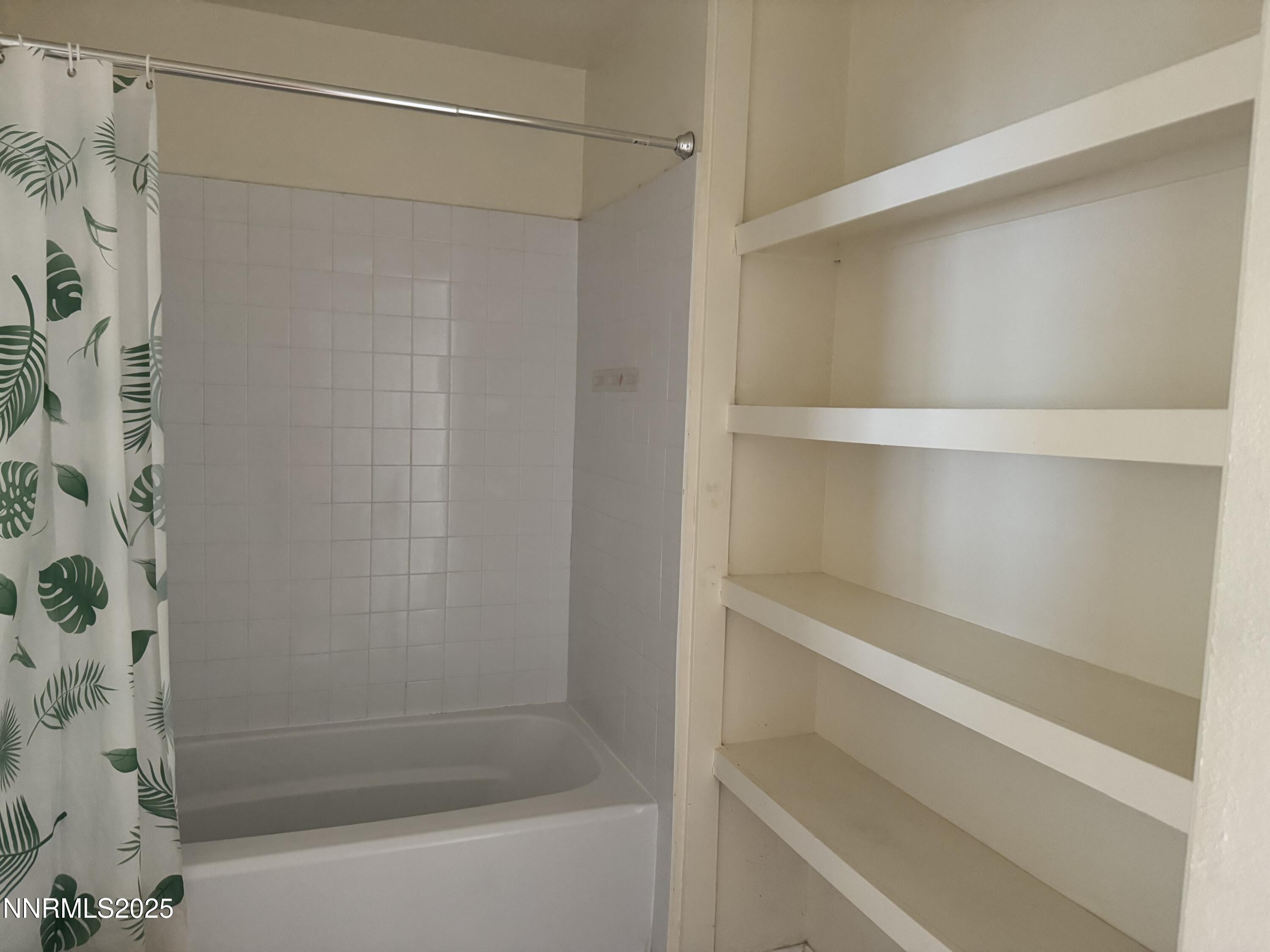 4600 Neil Road, Unit 33 Reno, NV 89502 - Photo 10 of 13 a bathroom with a shower