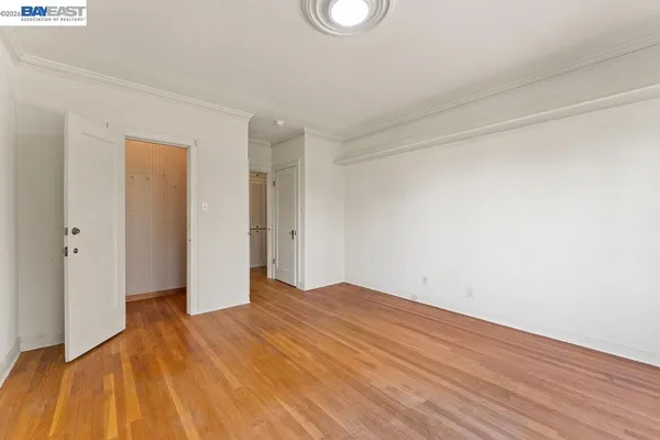 a view of a kitchen with a large window